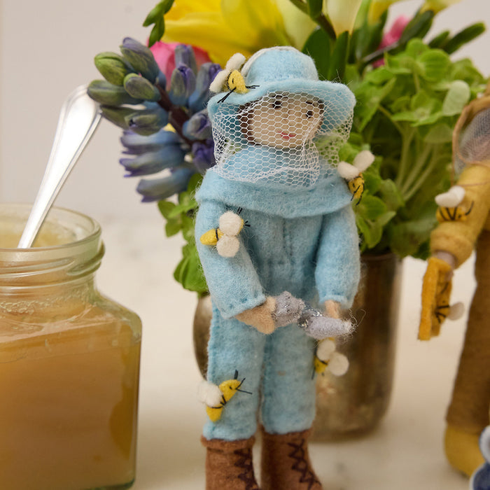 Handmade female beekeeper ornament from natural wool, ideal eco-conscious gift