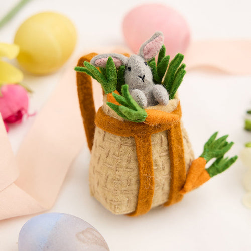 Felted baby bunny in woven-style pack basket – handmade Easter ornament for kids