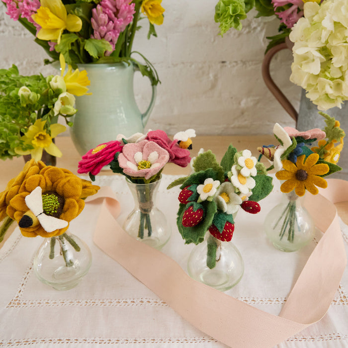 Whimsical wool strawberry and flower arrangement in handblown vase, perfect spring or summer gift.