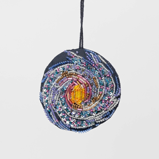 Beaded galaxy Christmas ornament featuring spiral Milky Way design with detailed embroidery. Handmade satin decoration for stargazers and space lovers. GIF