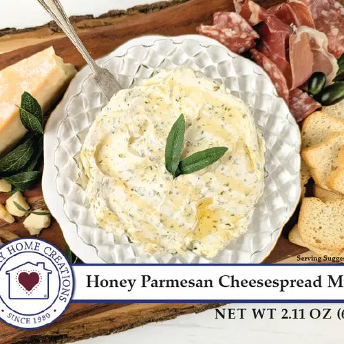 Honey Parmesan cheesespread with a spoon, cheese, and bread on a wooden board.