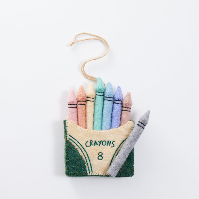 Felt pastel crayon box ornament with stitched details, handmade and fair trade.