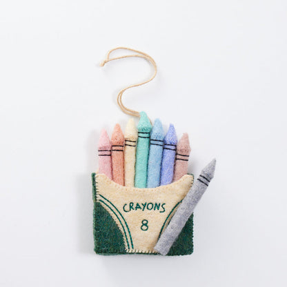 Felt pastel crayon box ornament with stitched details, handmade and fair trade.