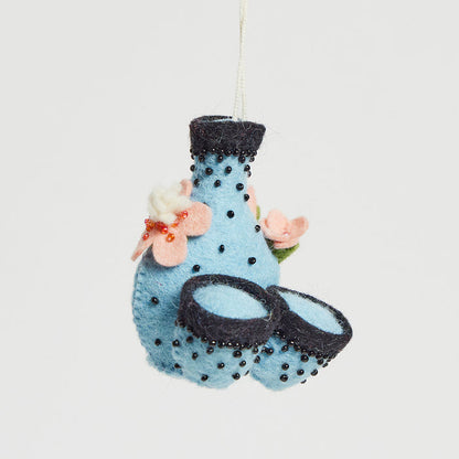 Handcrafted wool felt sake set ornament with blossom detailing – sake bottle and two cups, perfect Japanese-inspired holiday or host gift.