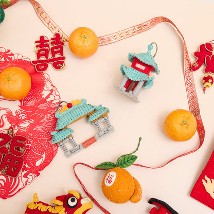 Chinese Chinatown Gate felt ornament with mystical embroidered dragons, symbolizing power and prosperity. Handmade from wool and ethically crafted.