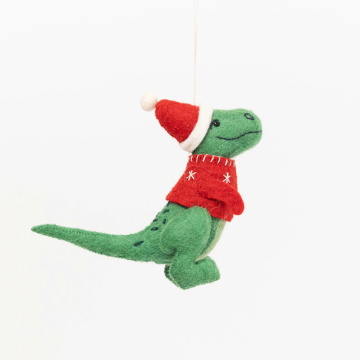 Handmade felt Santasaurus T-Rex ornament from Craftspring rotating to show front, side, and back views—featuring a red Santa hat, red sweater, and intricate embroidered details, highlighting artisan craftsmanship and festive holiday charm, ethically crafted using sustainable wool.
